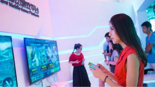 腾讯ChinaJoy“黑科技”微游戏机开启全新手游体验模式