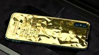 俄厂商推iPhone XS黄金定制手机：印美国总统头像 售价5000美元
