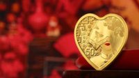 央行5月20日发行心形纪念币 网友：买了赠对象吗？