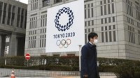 东京日增新冠病例超3000人 日方否认会中止奥运会