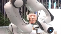全球首台全自动鼻咽拭子采样机器人发布 节约医疗资源