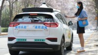 百度获中国首批自动驾驶主驾无人许可 “方向盘后无司机”成为现实