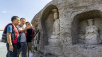 重庆连续高温水位大降：600年前的摩崖造像重见天日