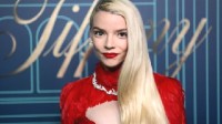 Anya Taylor-Joy attends a brand event with a sexy figure in a red dress