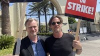 The Nolan brothers appeared at the scene of the Hollywood strike! Smiling and holding placards in support of the strike