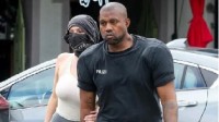 Kanye West and Wife Spotted in Los Angeles: Muscular Physique and Eye-catching Blue Shoes