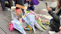 Friends Fans Pay Tribute to Matthew with Flowers at Apartment Set
