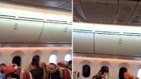 印度一客机飞行途中机舱漏水：旅客淡定观望/睡觉