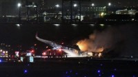 日本认定飞机相撞为航空事故 取消116架次航班 