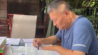 57岁梁实回应备战第28次高考：目标还是四川大学