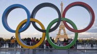 加价买票、在线拼房 年轻人到现场看奥运得花多少钱
