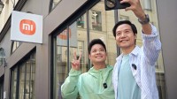 雷军带苏炳添体验SU7 苏神在线帮队友催雷总快点搞车
