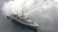 日本一木壳扫雷艇起火后倾覆 一名船员失踪