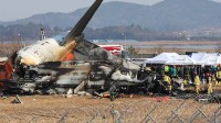 韩国遇难飞机幸存者接受采访 意识清醒可正常行走