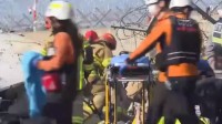 韩坠机事故遗体安置遭批评：仍放在地上 正在损毁腐烂