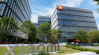 小米王化回应收购蔚来流言：几点了 几个菜?