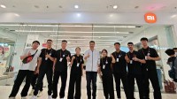 卢伟冰：高端手机家电卖得好 小米之家员工笑容洋溢
