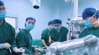 世界首例腰上种牙再移植手术我国完成 机器人立大功